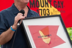 1024_john_ryan_from_mt_gay_presents_last_place_trophy_to_borrowed_horse_2014